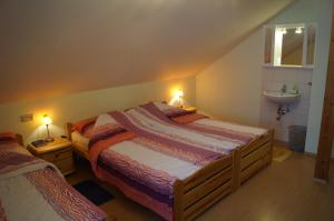 Кровать или кровати в номере Haus Bergblick