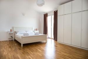 Postel nebo postele na pokoji v ubytování Villa Mira
