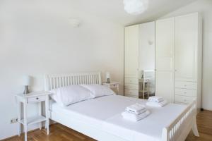 Postel nebo postele na pokoji v ubytování Villa Mira