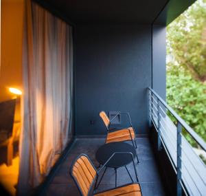 Posezení v ubytování One Suite Hotel