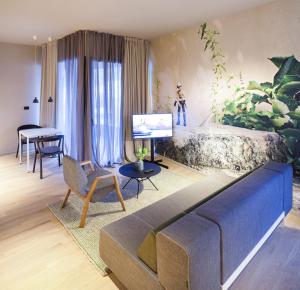 Posezení v ubytování One Suite Hotel