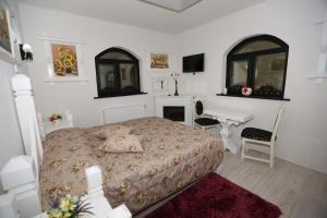 מיטה או מיטות בחדר ב-Complex Lions Bucovina