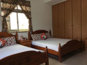 Una cama o camas en una habitación de Yuan Gong Yuan