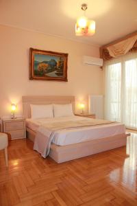 A bed or beds in a room at Olga's Studio