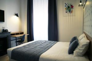 Postel nebo postele na pokoji v ubytování Hotel Saint Vincent + 26 fotografií