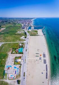 an aerial view of an island in the ocean at Hotel Aperio in Paralia Katerinis