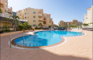 The swimming pool at or close to Apartamento Pargue Tropical
