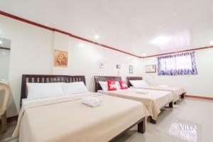 Postel nebo postele na pokoji v ubytování Hotel Georgina