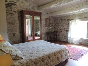 Postel nebo postele na pokoji v ubytování Nabat le Haut, chambre et table d'hotes