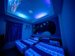Voodi või voodid majutusasutuse Blue Sea Romance B&B toas