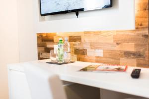 Sjónvarps- og/eða afþreyingartæki á Hotel Tilia