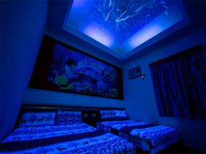 Voodi või voodid majutusasutuse Blue Sea Romance B&B toas