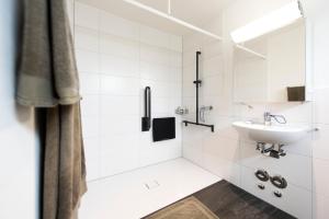 Baðherbergi á Hotel Tilia