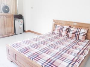 Postel nebo postele na pokoji v ubytování Chang Homestay