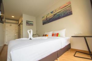 Postel nebo postele na pokoji v ubytování Ducati Bike Box Hotel + 19 fotografií