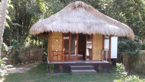 En have udenfor Airas' Garden Homestay ECO Bungalows