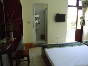 Giường trong phòng chung tại Kiman Old Town Hotel