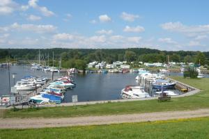 a bunch of boats are docked in a marina at Landgasthof Schützenhof Artlenburg in Artlenburg