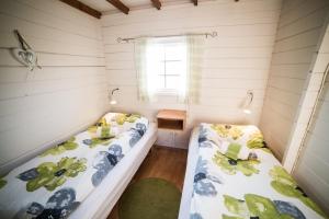 Postel nebo postele na pokoji v ubytování Geysir Hestar