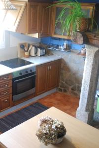 A kitchen or kitchenette at Casa Bartulo