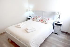 Posteľ alebo postele v izbe v ubytovaní Sleepin Sevilla Arenal