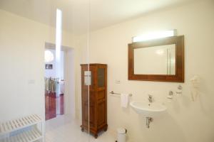 a bathroom with a sink and a mirror at Sopra il Limoneto in Cetara