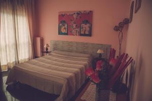 Postel nebo postele na pokoji v ubytování Cassiodoro Rooms Affittacamere