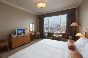 TV a/nebo společenská místnost v ubytování Beijing Hotel