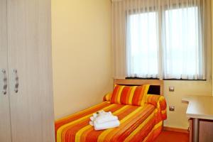 Posteľ alebo postele v izbe v ubytovaní Apartahotel Ribera