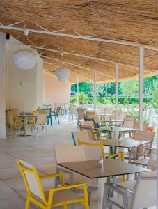 Un restaurant sau alt loc unde se poate mânca la Calypso Hotel - All Incluisve