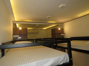Postel nebo postele na pokoji v ubytování Comfort Stay Hostel