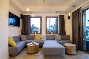 Гостиная зона в Novobilski - pod stokiem Kotelnica, obok Termy Bania