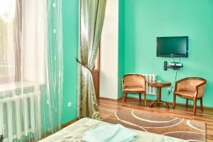 TV a/nebo společenská místnost v ubytování Hotel Art-Seg