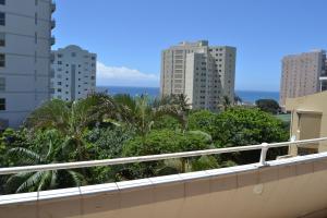 a view of the ocean from the balcony of a building at 104 Ipanema Beach in Durban