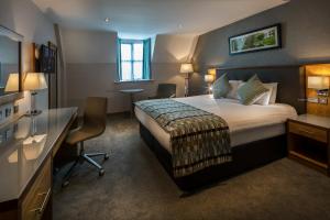 Krevet ili kreveti u jedinici u okviru objekta Westgrove Hotel