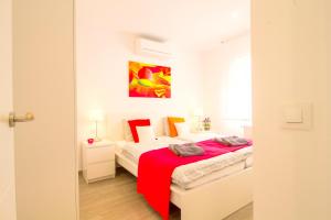 Posteľ alebo postele v izbe v ubytovaní LEON INMO Villa Palmera - 10337