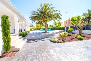 Vonkajšia záhrada v ubytovaní LEON INMO Villa Palmera - 10337