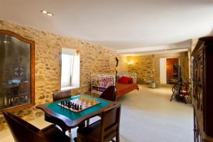 a living room with a chess board on a table at Quinta De Fundevila -quinta privada in Cabeceiras de Basto