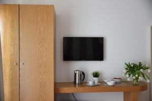 TV a/nebo společenská místnost v ubytování The Night Guest House