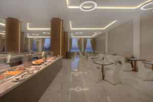 Vivaldi Hotel餐厅或其他用餐的地方