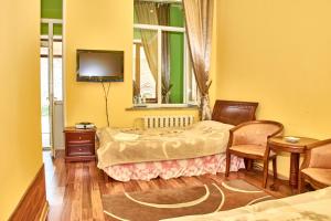 Televisyen dan/atau pusat hiburan di Hotel Art-Seg