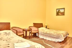 Katil atau katil-katil dalam bilik di Hotel Art-Seg