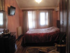 Postel nebo postele na pokoji v ubytování Metaxa Guesthouse