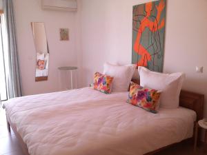 Ένα ή περισσότερα κρεβάτια σε δωμάτιο στο Formosa Village