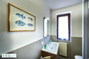 Koupelna v ubytování Casa Violetta + 12 fotografií