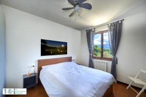 Postel nebo postele na pokoji v ubytování Casa Violetta