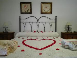 A bed or beds in a room at Casita de Rosario