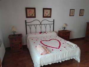 A bed or beds in a room at Casita de Rosario