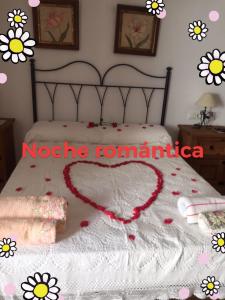 A bed or beds in a room at Casita de Rosario
