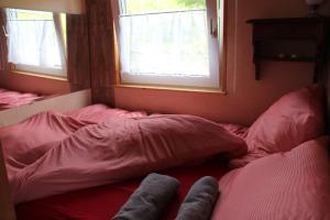 Säng eller sängar i ett rum på Hausboot Bounty